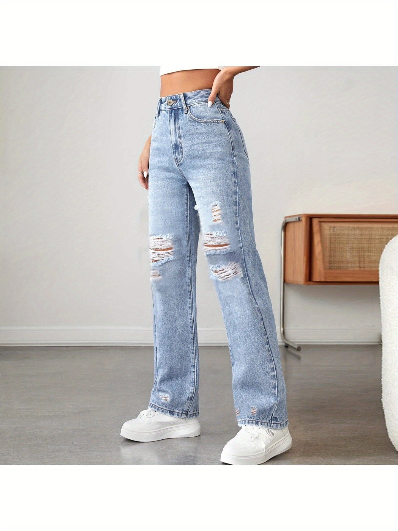 women’s high-waisted straight-leg ripped jeans.